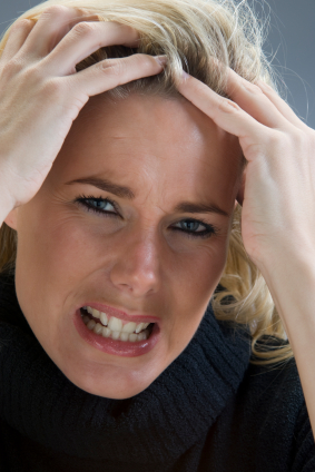 Image of a stressed out woman.
